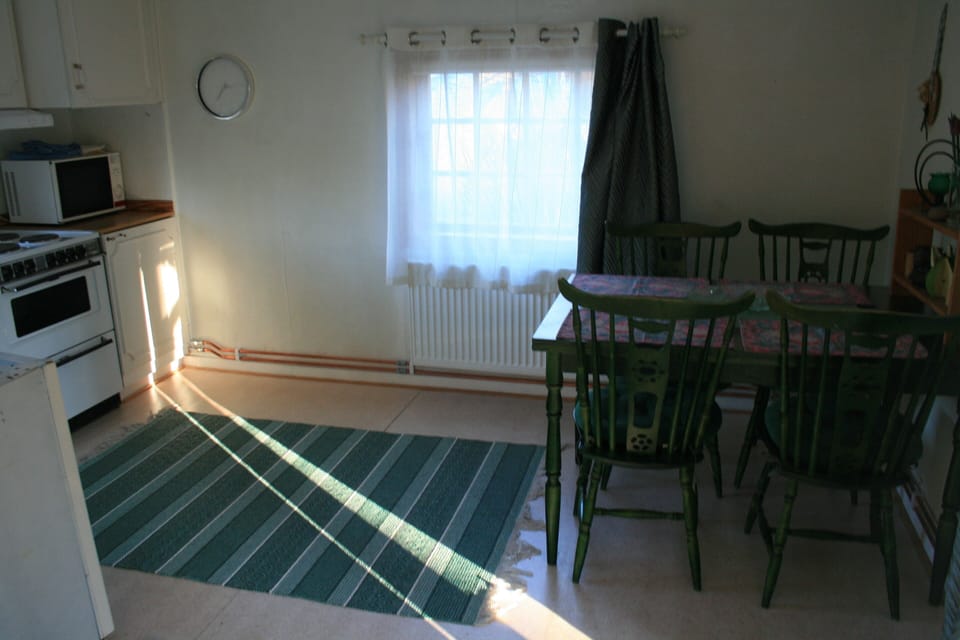 Kitchen and dining area -large stuga/cottage.