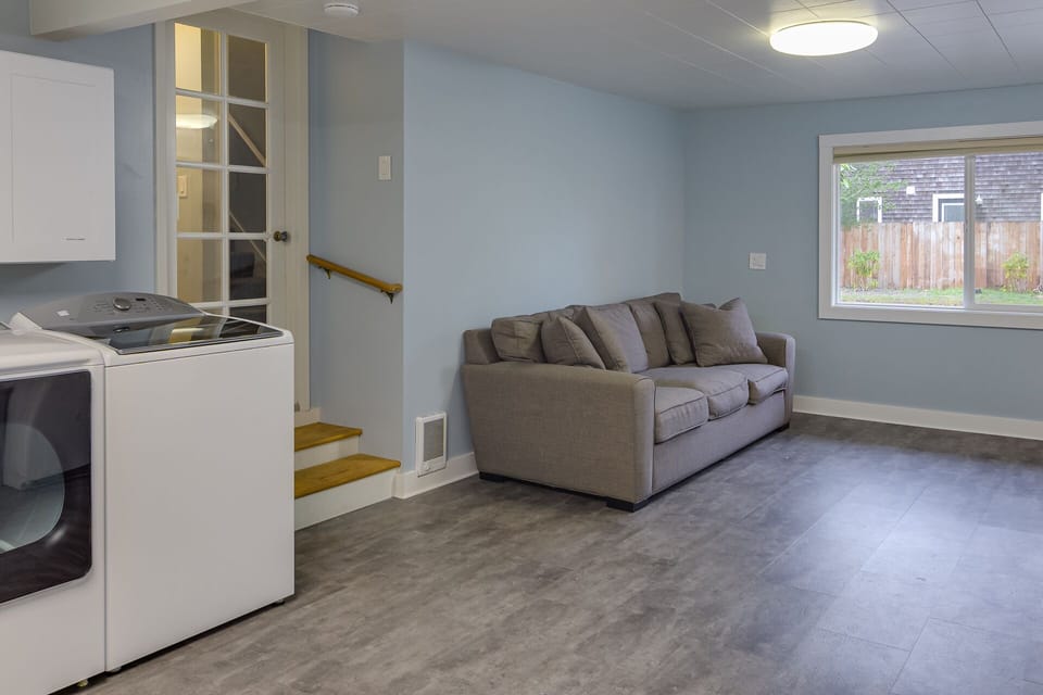 Lower level bonus room with extra capacity Washer & Dryer 