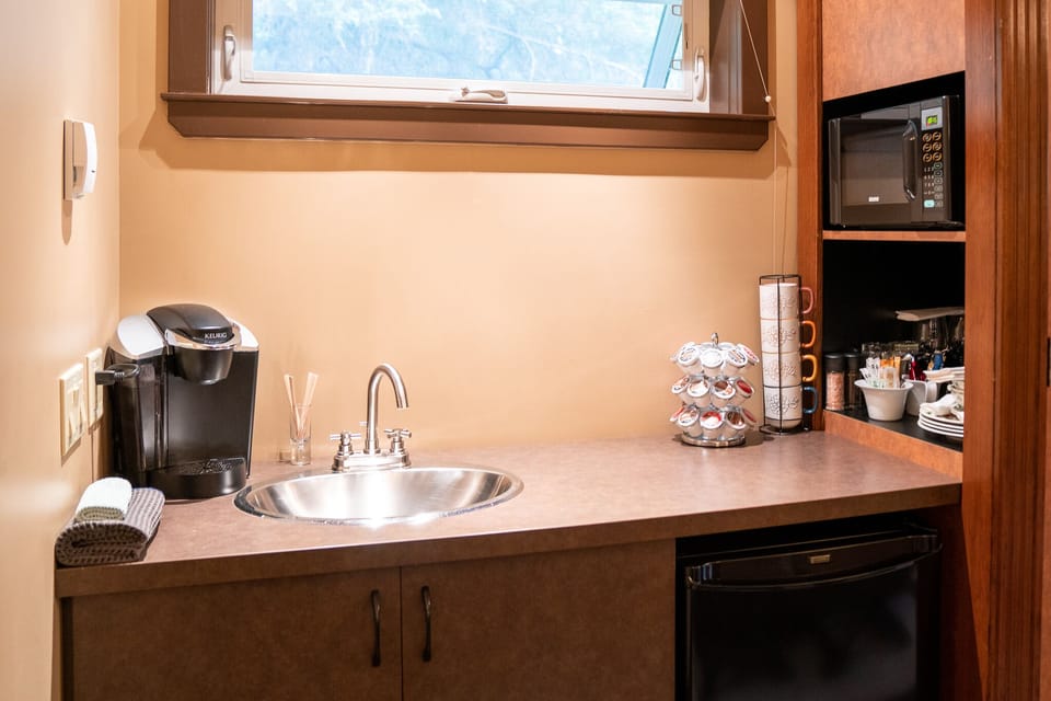 Microwave, kettle, toaster, fridge/freezer, Keurig/pods, dishes, glasses, etc.