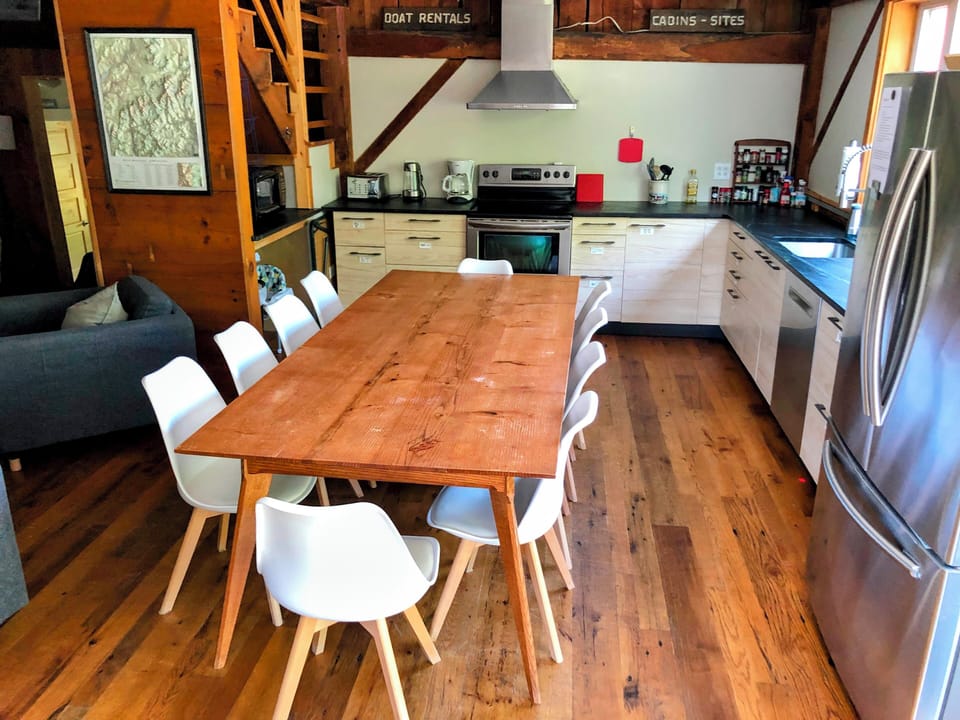 Bright kitchen overlooking lake. Rustic feel with modern comforts and design.