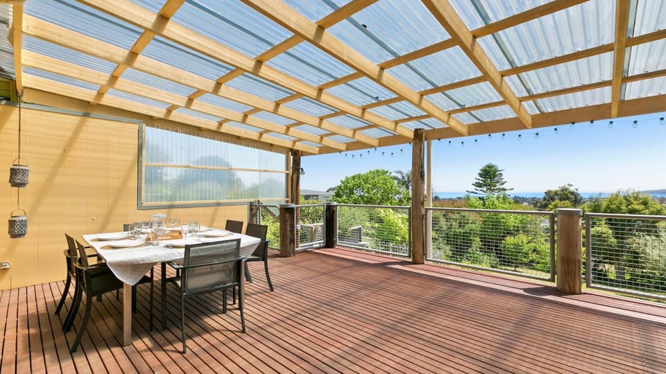 Large decking with outdoor dining and BBQ