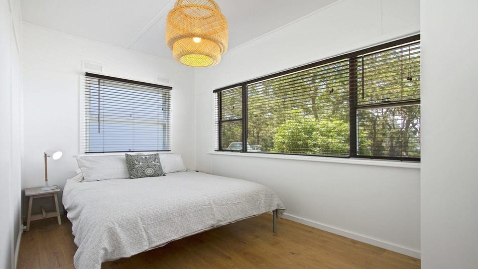 Bellevue | Bedroom 2 | Queen bed | Linen included | Porta cot available