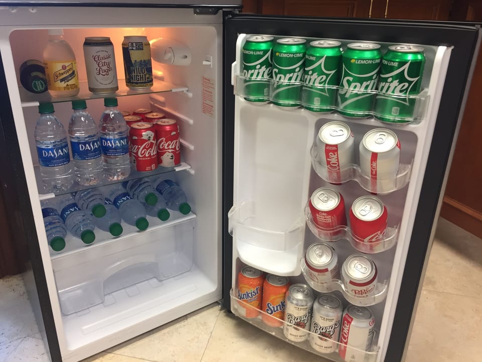 Complimentary cold drinks and bottled water in the Hospitality Lobby.
