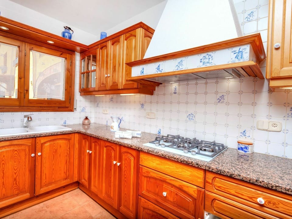 Countertop, Cabinetry, Furniture, Property, Sink, Kitchen, Wood, Drawer, Orange, Interior Design
