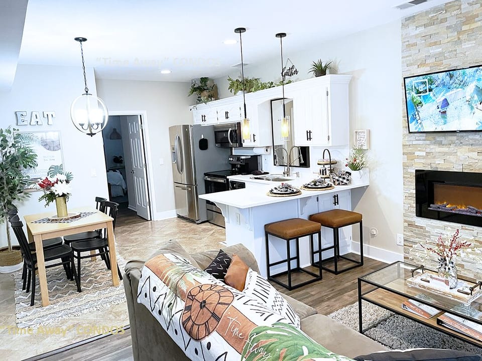 Beautiful living room with SMART TV or just sit by the fireplace and read/relax.