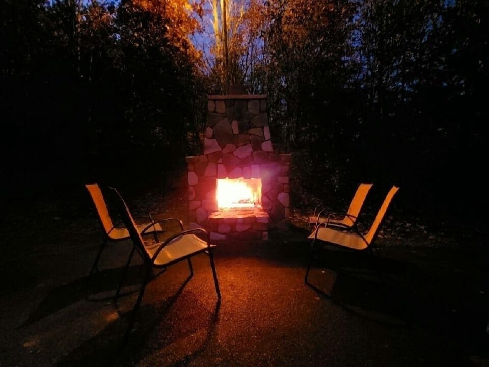 Wood burning fireplace outside to roast marshmallows and tell stories...