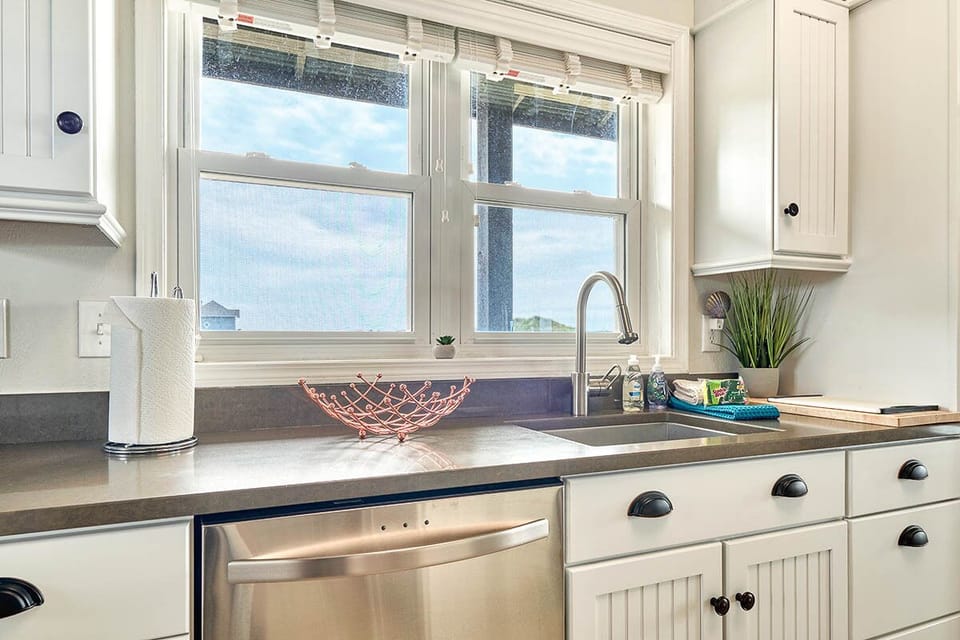 The large deep bowled sink next to the dishwasher makes clean up a breeze