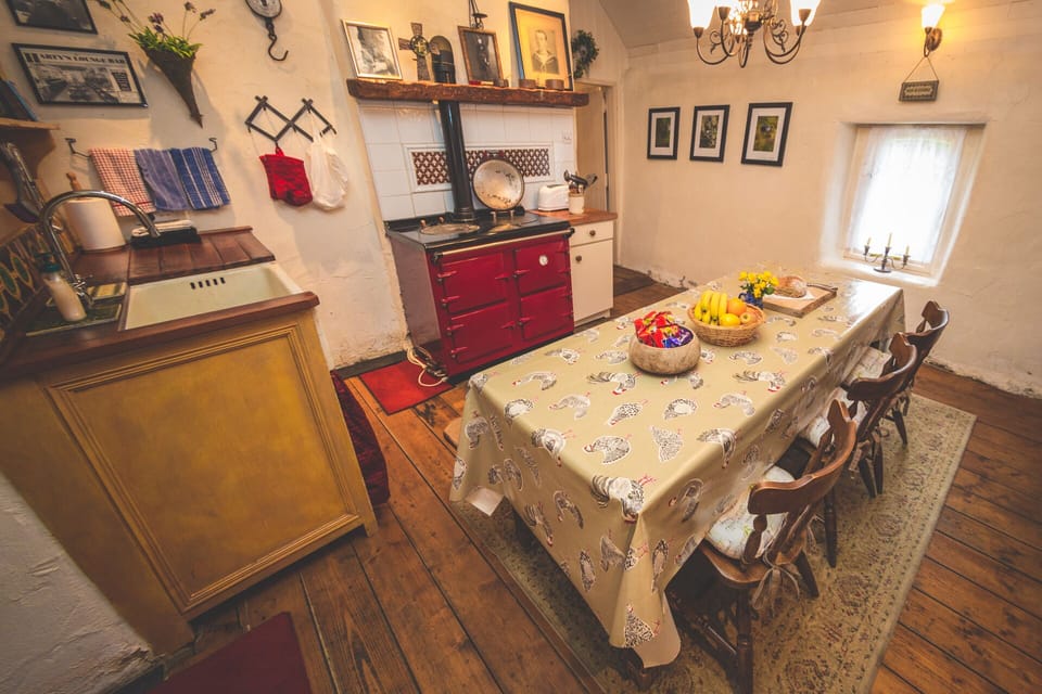 Large farm table graces the heart of the home. Heritage cooker is amazing