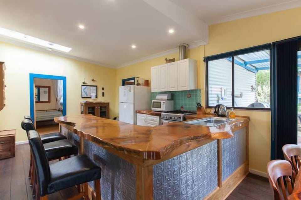 Kitchen counter made out of slab of pine