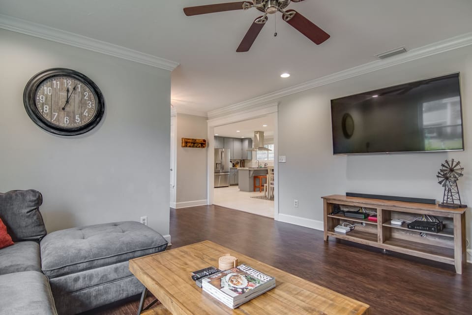 Comfortable Living Room w/ 65" TV & Surround Sound