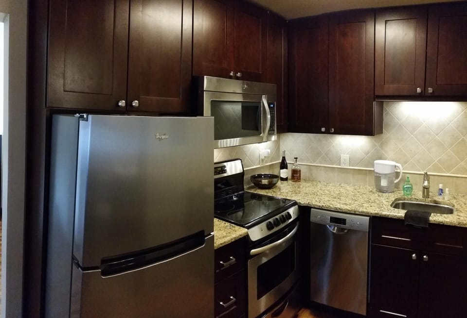 Kitchen all new cabinets, appliances (including dishwasher) and granite counters