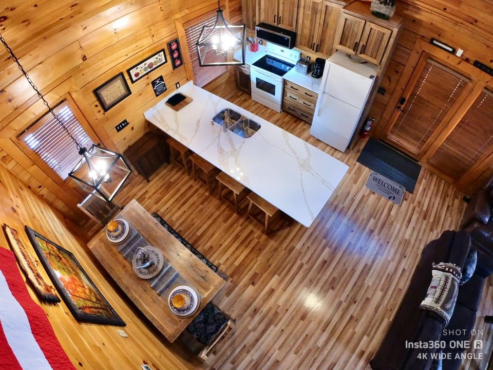 Newly remodeled kitchen, extended countertop, microwave, cabinets.