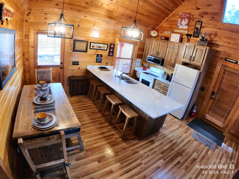 Newly remodeled kitchen, extended countertop, microwave, cabinets.