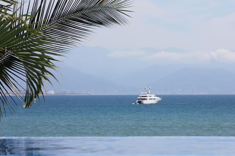 Yacht as viewed from Casa Kaeli's infiniti pool.
