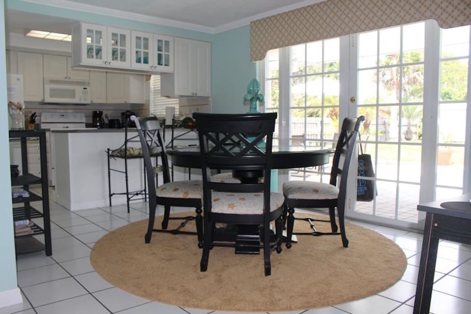 Dining room with view into kitchen. Seating for 6.