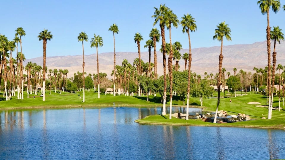 More of the SPECTACULAR view this home has. Mountains, golf course & lake.