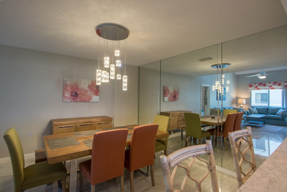 Dining area for six guest and showing designer lighting.