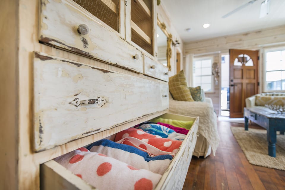 Beach Towels in a Shabby Chic Dresser.