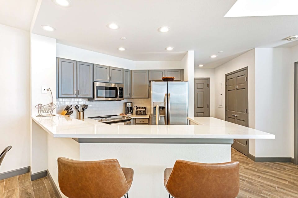 Keep the "chef" of the house company while you watch the kitchen action from the breakfast bar.
