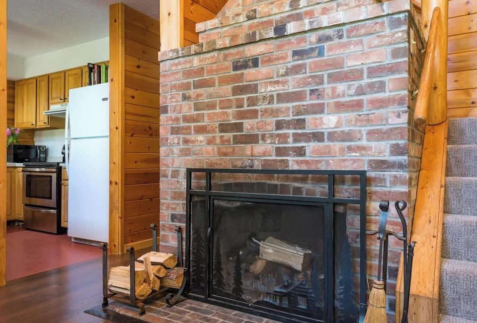 Fireplace with wood for guests