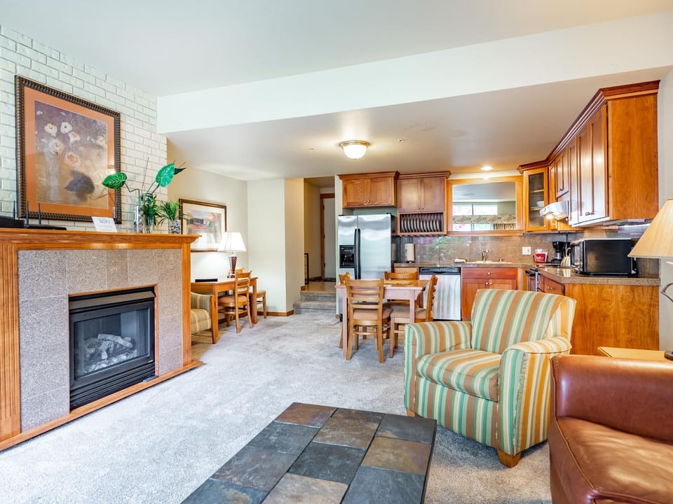 Living area-electric fireplace-kitchen