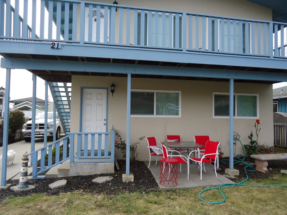 sitting area in front, front  yard is now pavers
