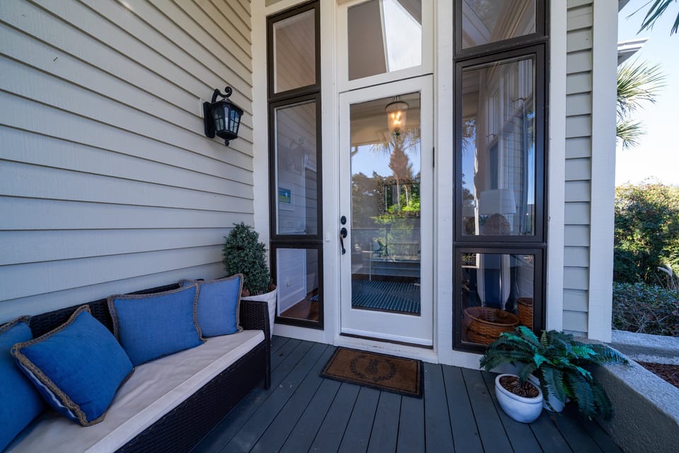 A large front porch welcomes your arrival.