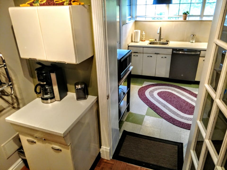 We chose upcycled Raymond Loewy metal Cabinets for the  Kitchen & Coffee Station
