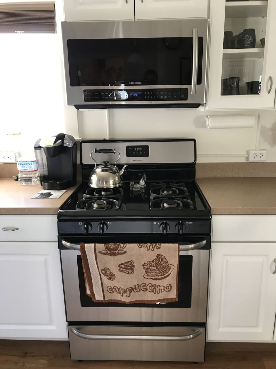 Propane stainless steel range with microwave above
