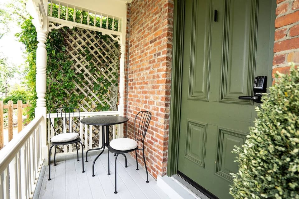 The room has its own private patio with a bistro set