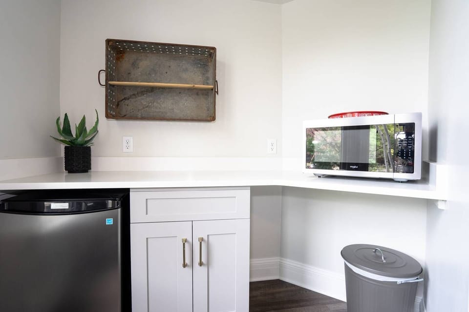 The room has its own dining seat, microwave and mini fridge.