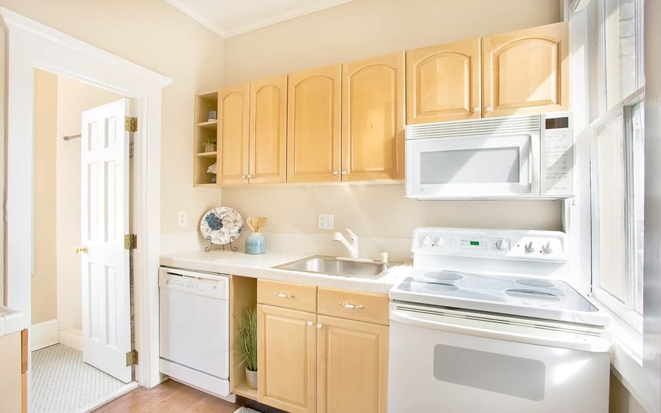 The bright and sunny kitchen has every essential!