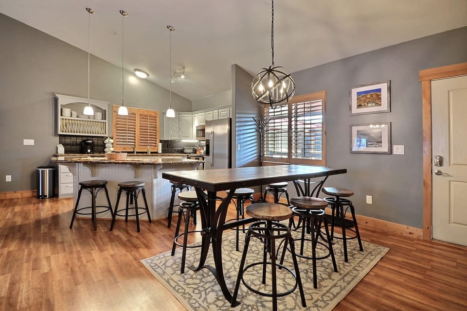 Dining Area (seats 6 at the table) and Kitchen with Breakfast Bar (seats 3 more)