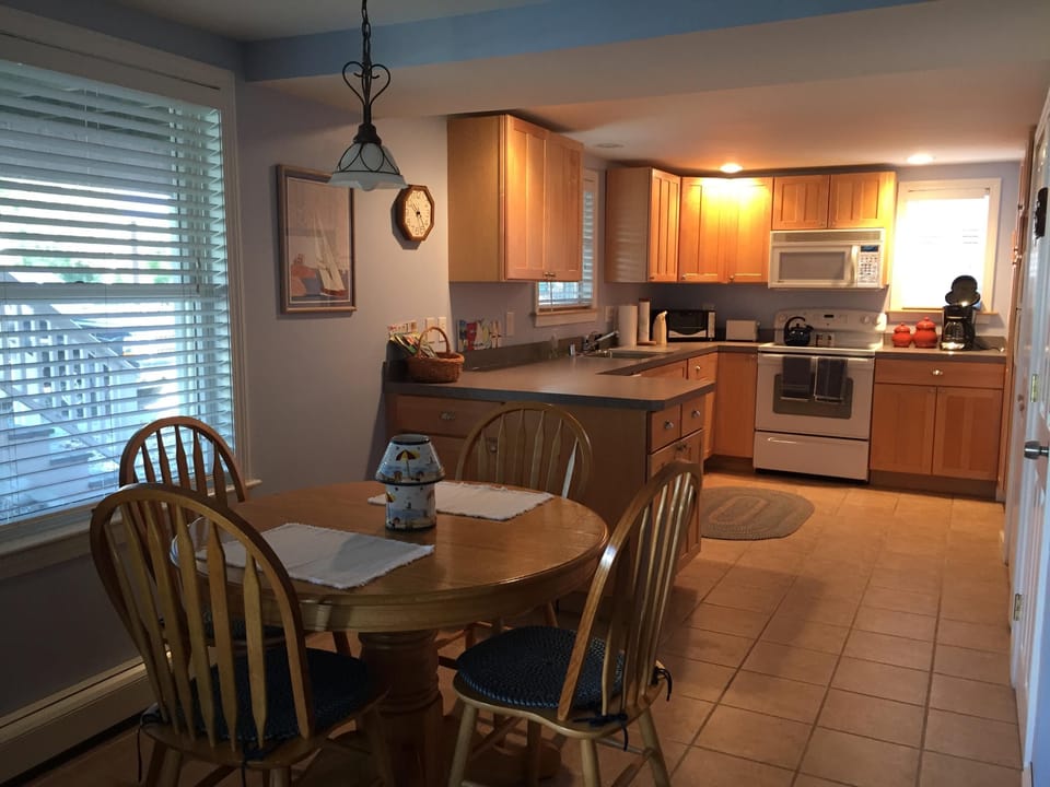 Open, airy kitchen dining area.