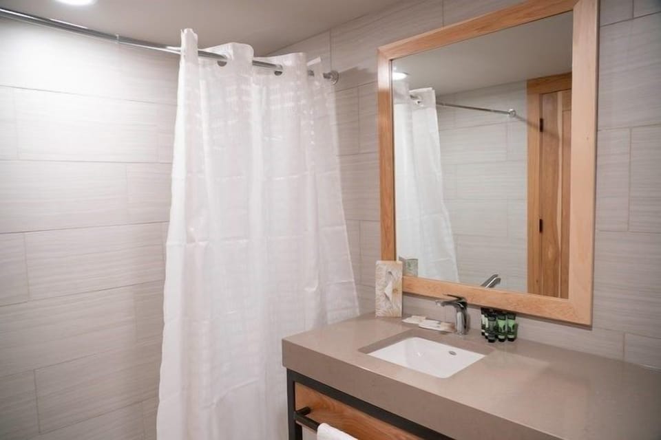 Get ready for your day in the lovely bathroom.