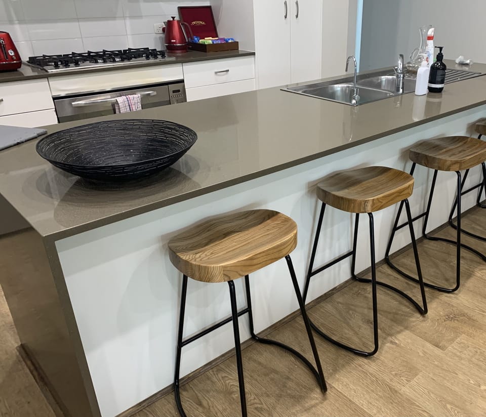 Island bench with microwave, dishwasher and 4 bar stools