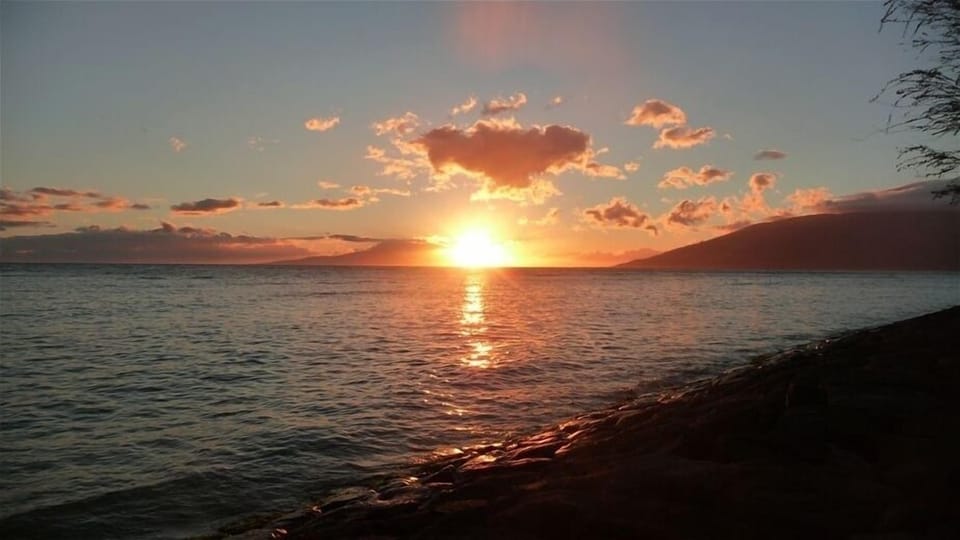 Wade in the water and watch the sunset. Kam II , across from our condo complex.
