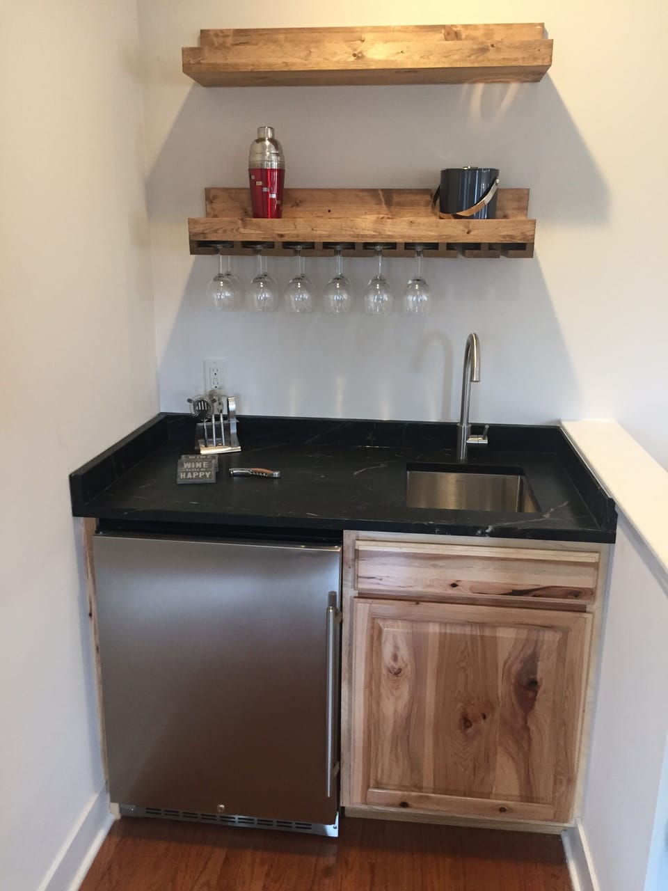 Bar area on main floor with extra refrigerator