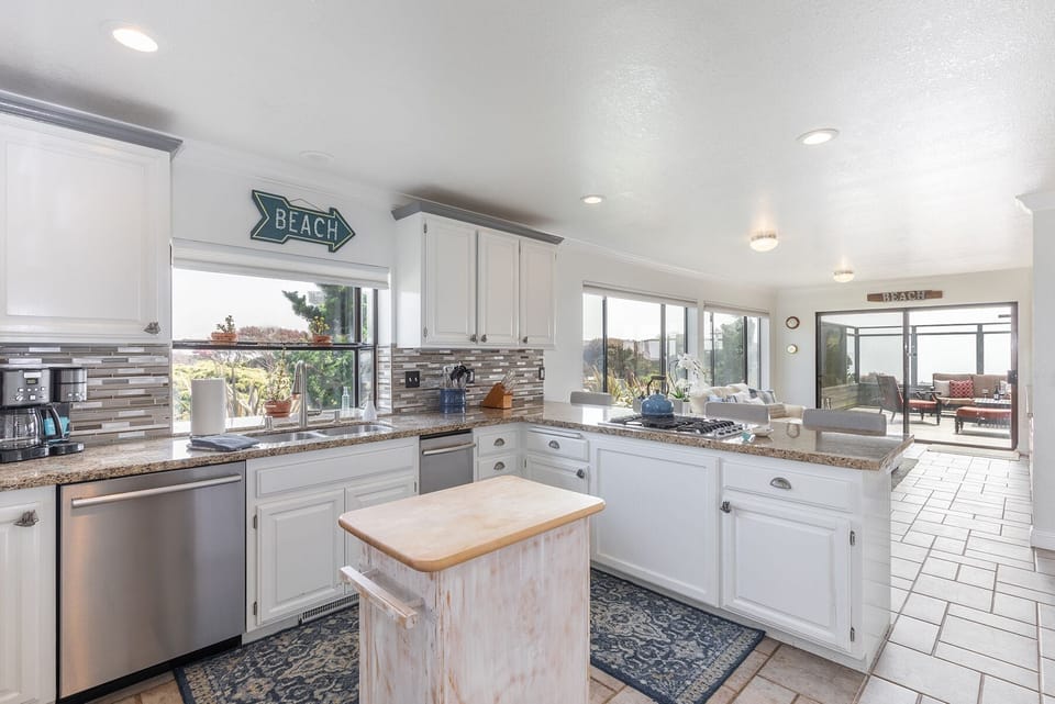 Fully stocked kitchen that is ready to cook in.
