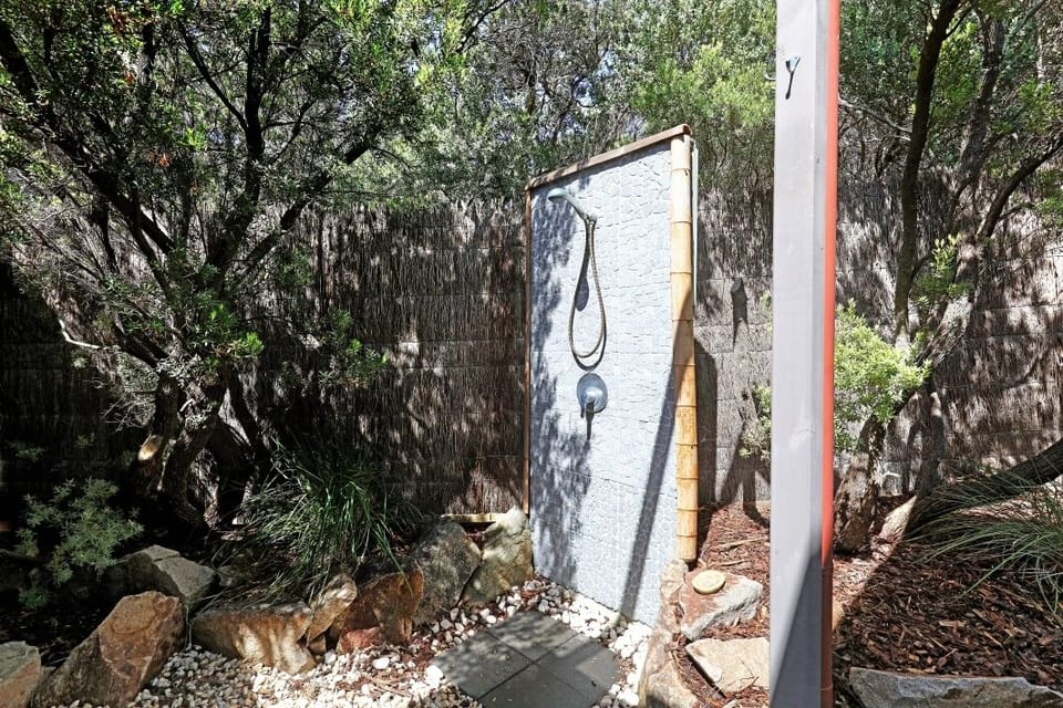 Wash away the day at the beach under the hot and cold outdoor shower!