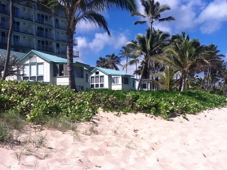 The cottage buildings from the beachfront. Each cottage is a 4-plex building.