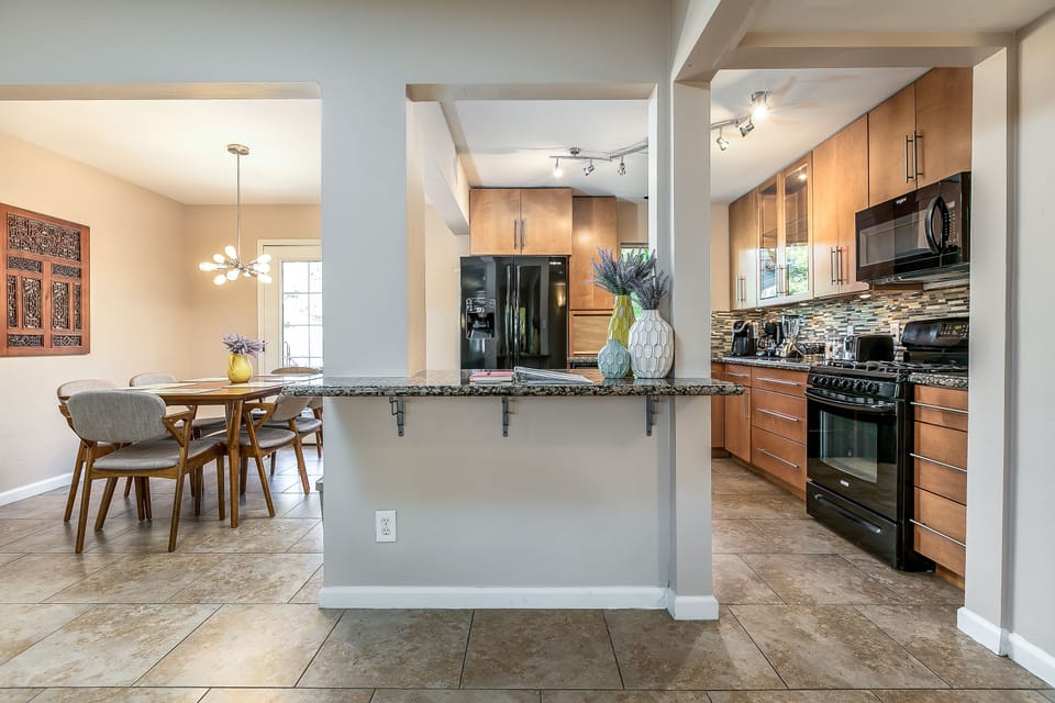 Recently remodeled kitchen full kitchen with breakfast items in the cabinet