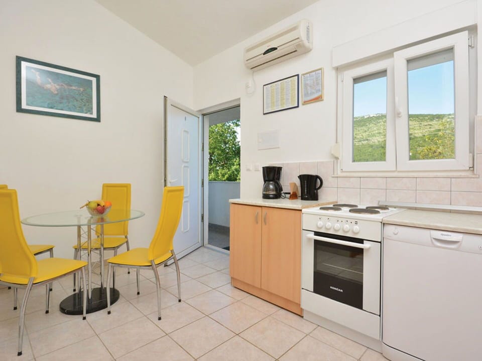 Property, Room, Furniture, Yellow, Interior Design, Building, Kitchen, House, Floor, Real Estate