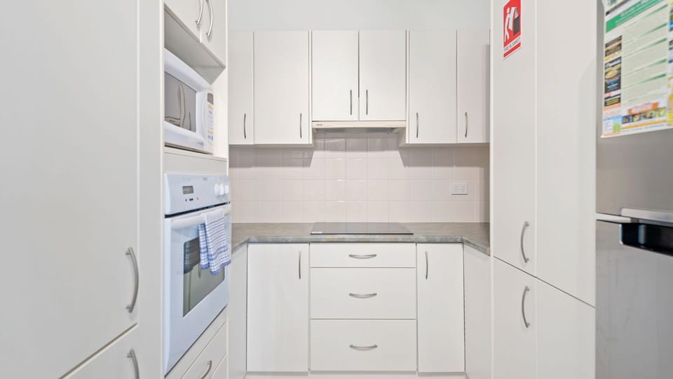 The fully equipped kitchen includes a handy dishwasher
