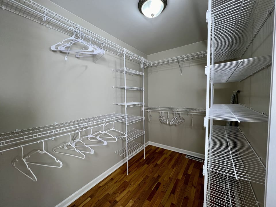 PRIMARY BEDROOM:en-suite bath,huge walk-in closet,french doors to backyard/pool