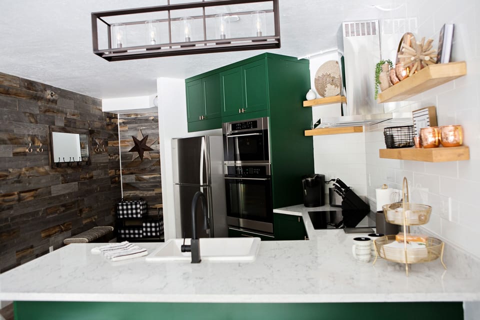 Fully appointed kitchen with bar seats for four.