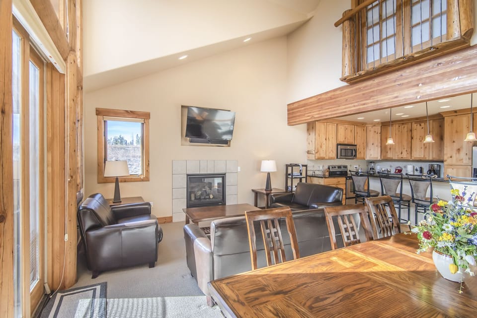 Living Area - Natural light flows in with the large windows.