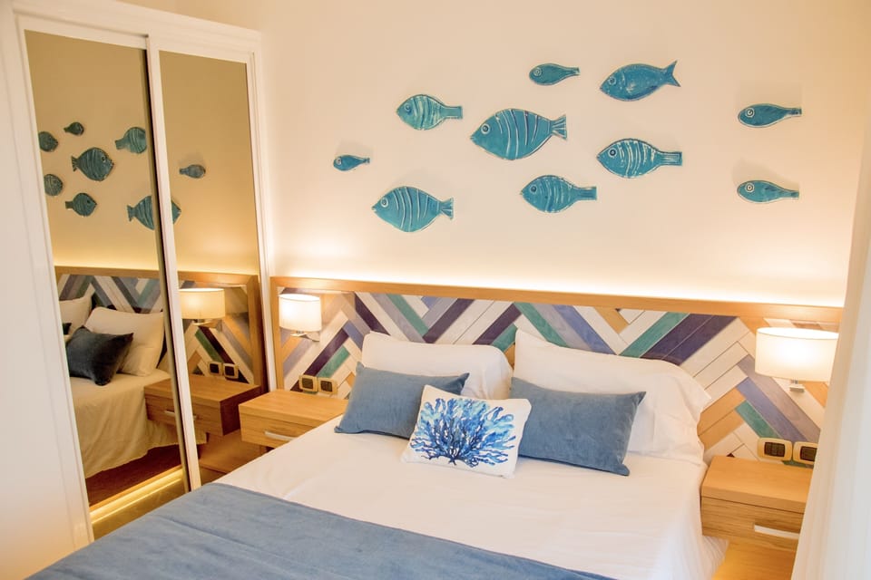 The master bedroom has a queen-size bed