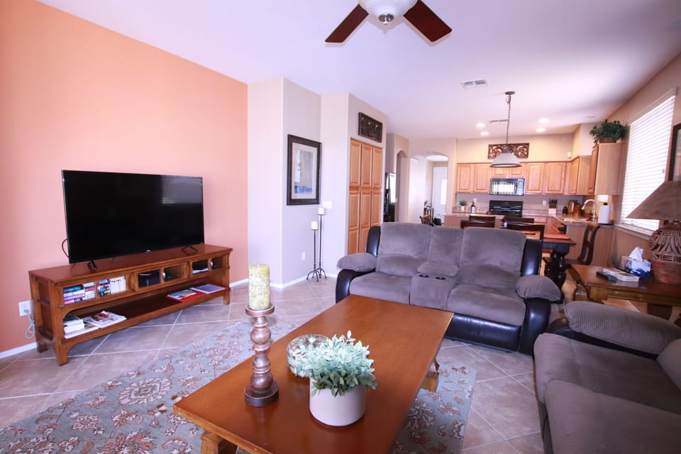 Living room with kitchen in background