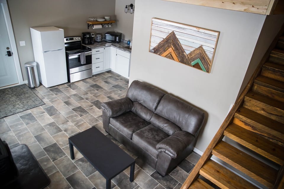 Cozy living room with propane fireplace.